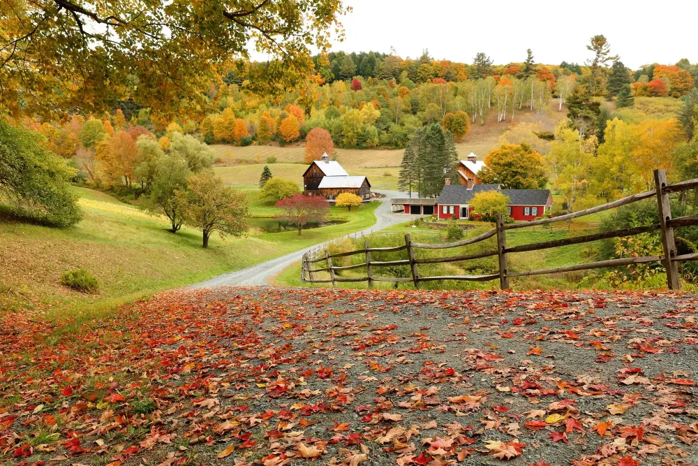 vermont scene with barn roads and fall foliage